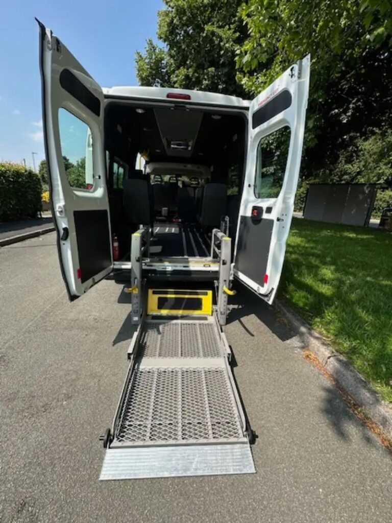 Electric tail-lift wheelchair taxi in Peterborough