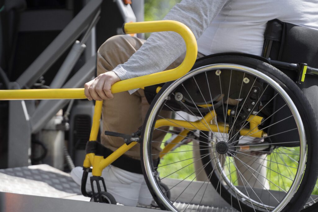 Wheelchair taxi service with tail-lift access